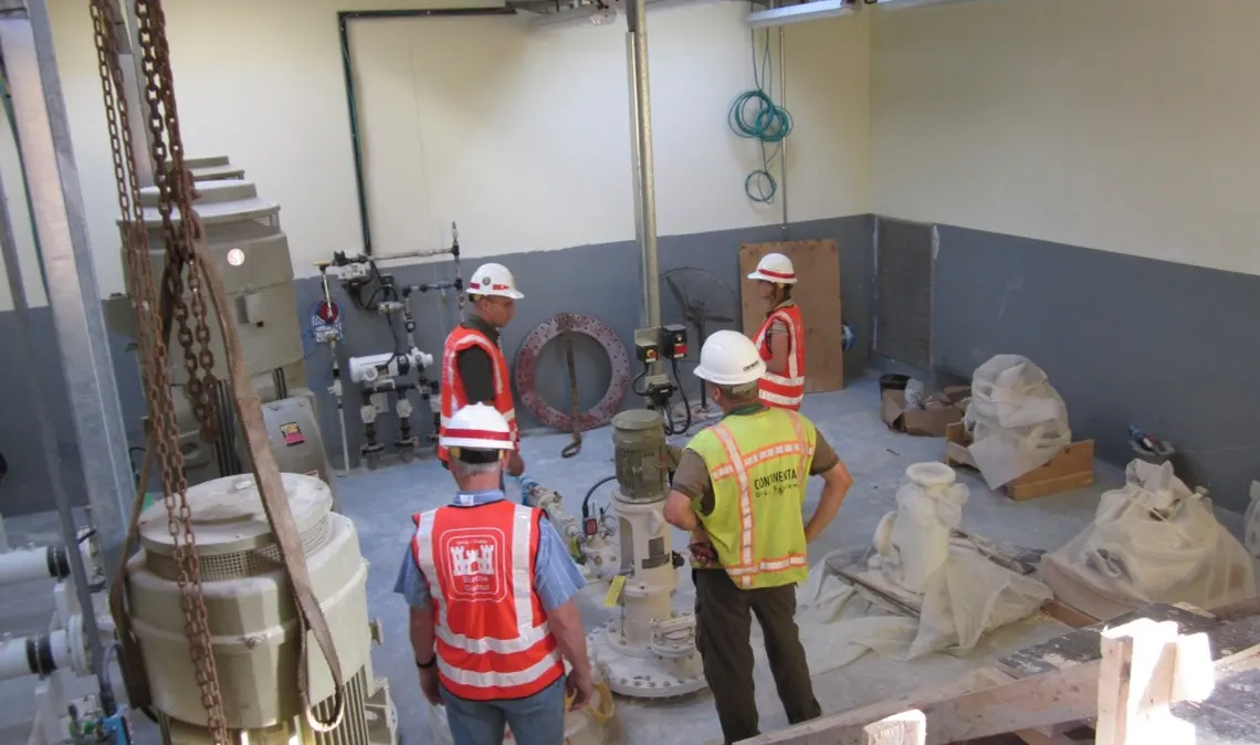 Engineering team reviewing work on site